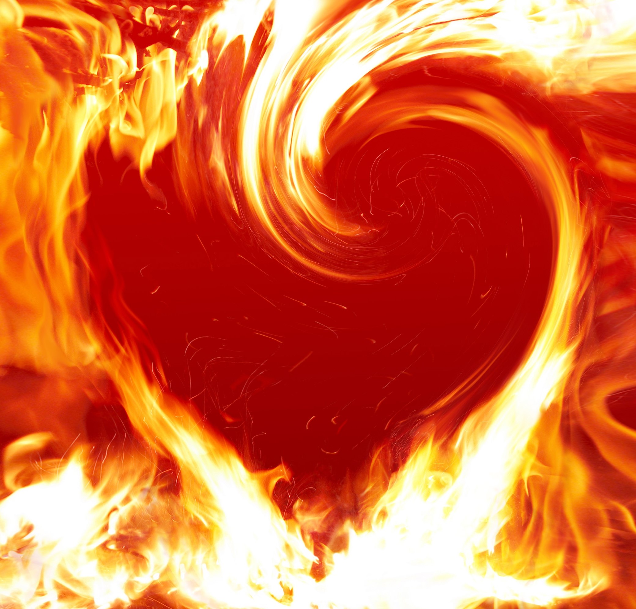 flaming red heart abstract with white and yellow flames forming the outline of a heart